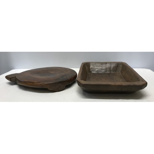 970 - A rustic hand craved wooden tray 37.5cm l x 26cm w x 6cm d together with a hand craved heavy wooden ... 