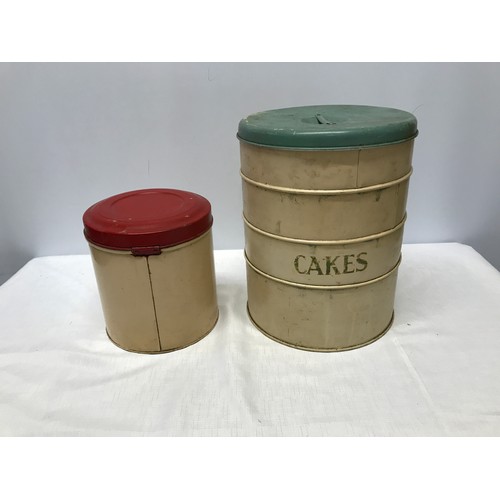 A vintage enamel Tala tiered cake tin 30cm h x 23cm w together with a Tala flour tin 19cm h x 18cm w