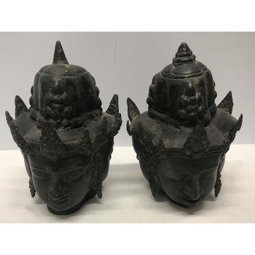 1054 - Pair of Tibetan bronze three headed busts 21cm h x 15cm w.