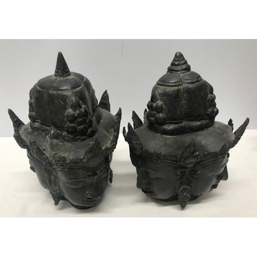 1054 - Pair of Tibetan bronze three headed busts 21cm h x 15cm w.