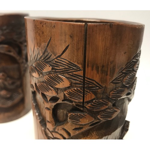 1055 - A pair of Japanese craved bamboo brush pots, 14cm h x 8cm w.