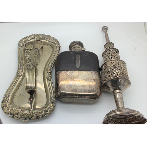 1056 - A plated candlesnuffer on a tray, a leather and plated hip flask and a white metal filigree incense ... 