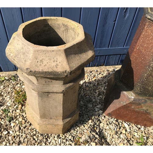 1515 - A tall crowned brown glazed chimney pot 106cm, a small limestone chimney pot 55cm and a large stonew... 