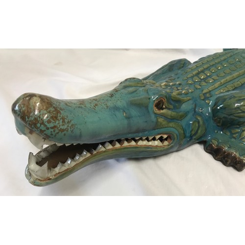 1520 - Large green glazed pottery alligator ornament approx 82cms l.