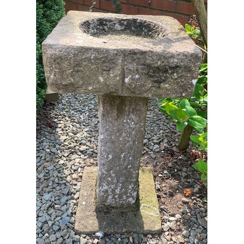 1532 - A Stone bird bath, 68cms h x 32cms square base.