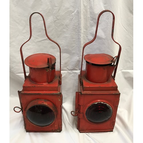 1535 - A pair of railway lamps, red, one with BR stamp British Railway, height including handle 53cms h.