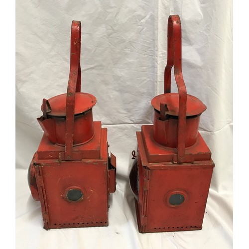 1535 - A pair of railway lamps, red, one with BR stamp British Railway, height including handle 53cms h.