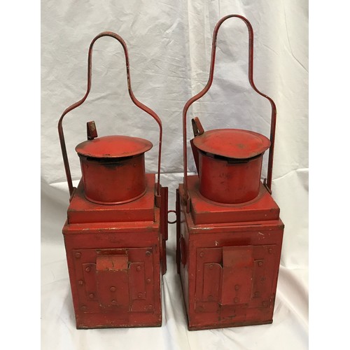 1535 - A pair of railway lamps, red, one with BR stamp British Railway, height including handle 53cms h.