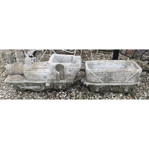 1537 - A concrete garden ornament/planter train engine and tender. Engine 72cms l x 40cms h. Tender 50cms l... 