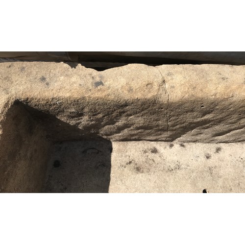 1541 - Limestone planter 56cms w x 40cms x l x 19cms h together with a craved circular limestone with cross... 