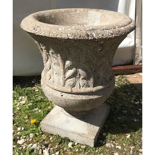 1542 - Concrete garden urn with leaf pattern to sides 52cms h x 44cms w.