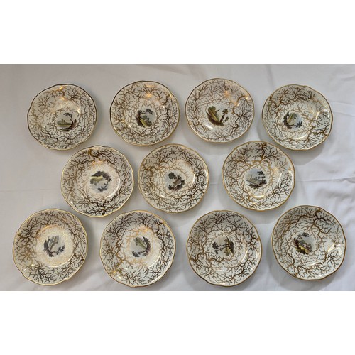 243 - A Rockingham seaweed porcelain part tea service, some pieces bearing the puce factory mark Rockingha... 