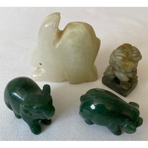 1147A - Four various green stone animals to include pig , elephant, rabbit and dog of fo. Rabbit 5.5cms h.
