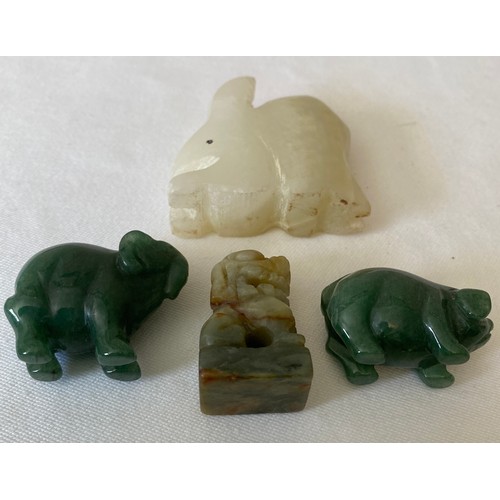 1147A - Four various green stone animals to include pig , elephant, rabbit and dog of fo. Rabbit 5.5cms h.
