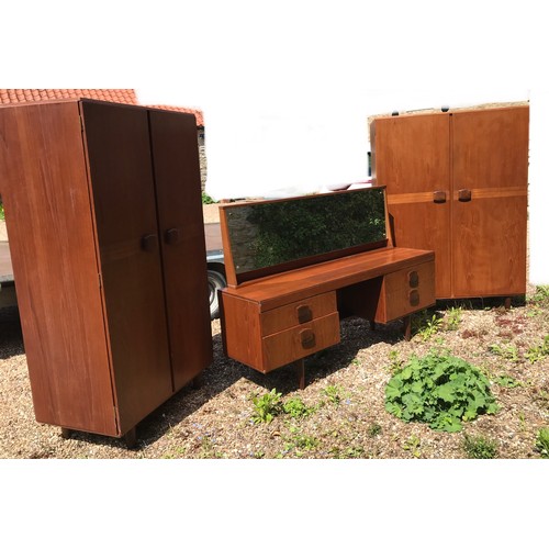 1512B - Teak three Stonehill Furniture bedroom suite, ladies and gents wardrobes and a dressing table. Wardr... 