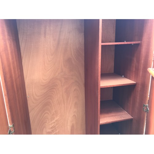 1512B - Teak three Stonehill Furniture bedroom suite, ladies and gents wardrobes and a dressing table. Wardr... 