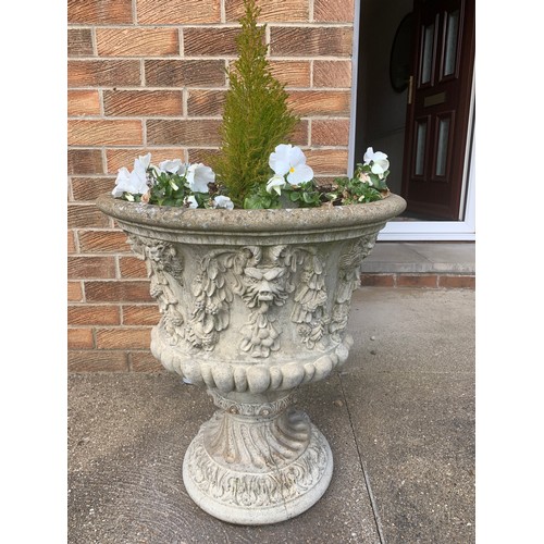 1545A - Two reconstituted stone garden urns. 60cms h x 53cms d.