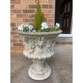 Two reconstituted stone garden urns. 60cms h x 53cms d.