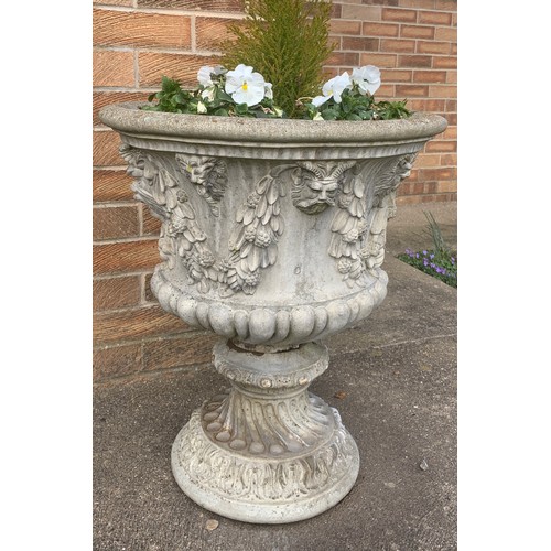 1545A - Two reconstituted stone garden urns. 60cms h x 53cms d.