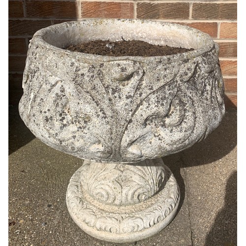 1545B - A single reconstituted stone urn. 46cms h x 43cms d.