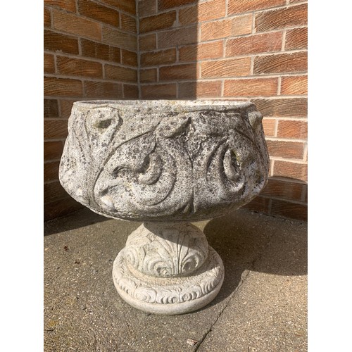 1545B - A single reconstituted stone urn. 46cms h x 43cms d.