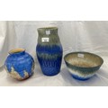 A Ruskin Pottery crystalline vase and bowl decorated in shades of blue. Vase marked to base Ruskin E... 