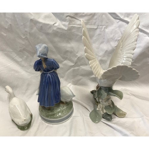16 - Two Royal Copenhagen figures, Girl in Clogs 24cms h and Goose 10cms together with a Lladro figurine ... 