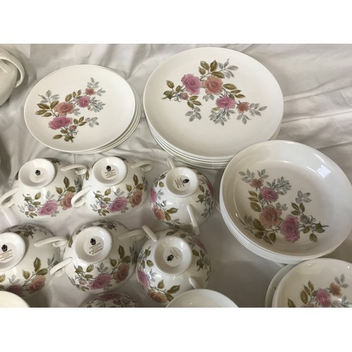 18 - A quantity of Wedgewood dinnerware. Twenty one  pieces of 