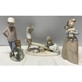 Three Nao Lladro figurines : Girl with Clown Doll 22.5cms h, Boy with Dog 23cms h and Boy and Girl o... 