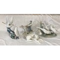 A group of Lladro and Nao Llado figures to include: Nao Grey and White Dog 10cms h x 18,5cms l, Llad... 
