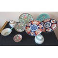 A collection of 19th/20thC Oriental ceramics to include 2 ginger jars, 2 Imari plates 21cms d, rice ... 