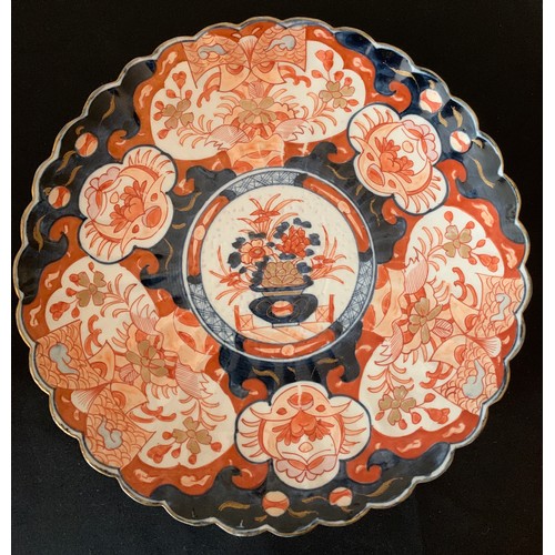 60 - A 19th Imari pattern plate, 30cms d.