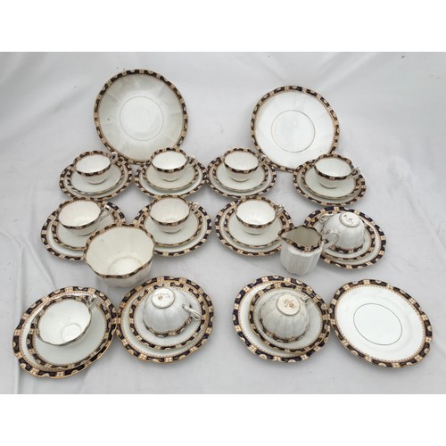 67 - A part tea set of Court China W.L.L. blue and gilt. Thirty eight pieces comprising : 2 cake plates 2... 