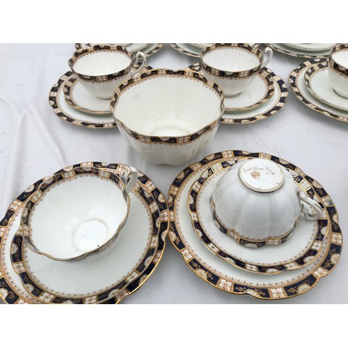 67 - A part tea set of Court China W.L.L. blue and gilt. Thirty eight pieces comprising : 2 cake plates 2... 