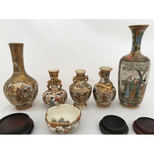 68 - Satsuma ware to include a tall vase 18cms h, gilt vase 15cms h, three small vases: lion handle 9cms ... 