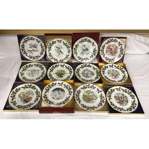 71 - A collection of 12 Royal Grafton decorative wall plates, Christmas 1976 to 1987. 22cms w with packag... 