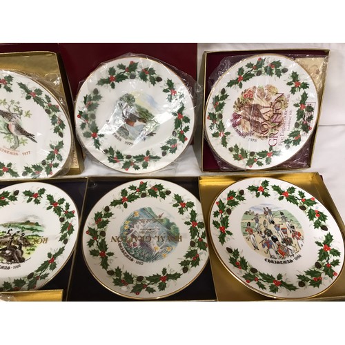 71 - A collection of 12 Royal Grafton decorative wall plates, Christmas 1976 to 1987. 22cms w with packag... 