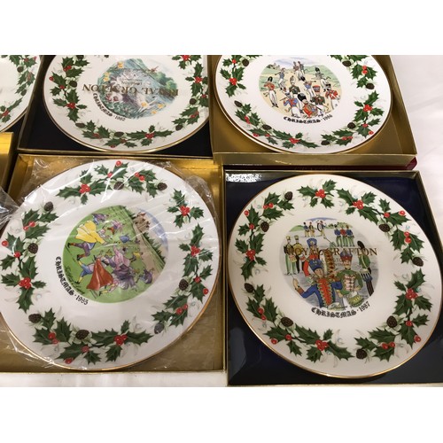 71 - A collection of 12 Royal Grafton decorative wall plates, Christmas 1976 to 1987. 22cms w with packag... 