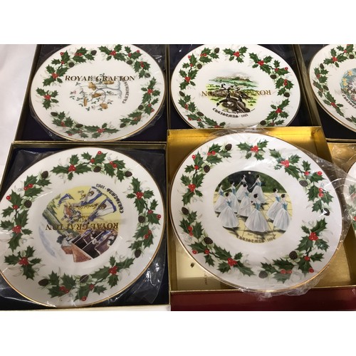 71 - A collection of 12 Royal Grafton decorative wall plates, Christmas 1976 to 1987. 22cms w with packag... 