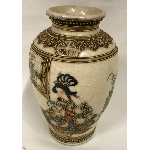 76 - A small Satsuma vase with gilt decoration and a panel depicting a Geisha girl. 13cms h.