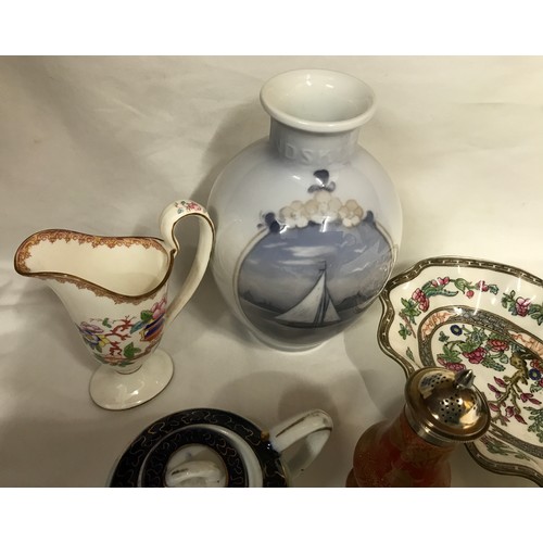 77 - A mixed lot of pottery to include a Royal Copenhagen vase 17cms, Coalport Indian Tree cup and saucer... 