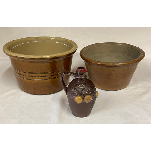 81 - Three pieces of stoneware to include a French Turgis Normandy calvados bottle. Largest 27cms d. Bott... 