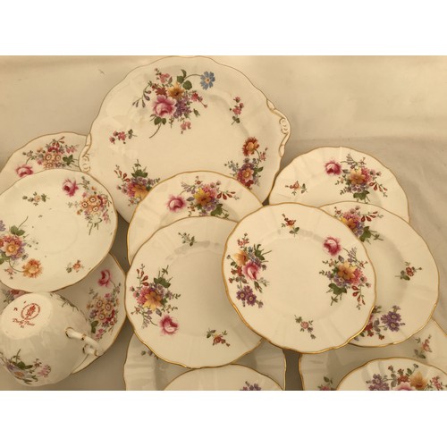 85 - A Royal Crown Derby 34 piece part tea service, Derby Posies comprising: 6 cups 7cms h, 10 saucers, 1... 