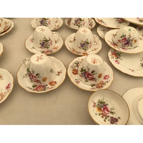 85 - A Royal Crown Derby 34 piece part tea service, Derby Posies comprising: 6 cups 7cms h, 10 saucers, 1... 