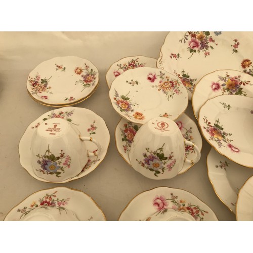 85 - A Royal Crown Derby 34 piece part tea service, Derby Posies comprising: 6 cups 7cms h, 10 saucers, 1... 