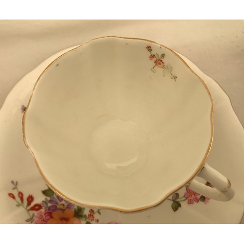 85 - A Royal Crown Derby 34 piece part tea service, Derby Posies comprising: 6 cups 7cms h, 10 saucers, 1... 