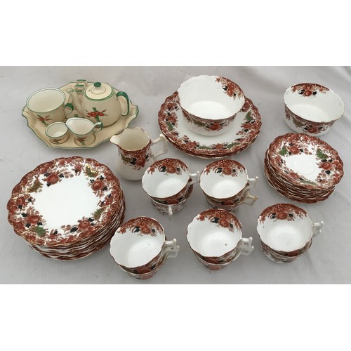 87 - A part Wellington china tea service to include one milk jug, 2 sugars, 10 cups, 10 saucers, 2 plates... 