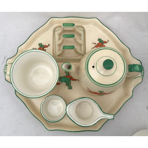 87 - A part Wellington china tea service to include one milk jug, 2 sugars, 10 cups, 10 saucers, 2 plates... 