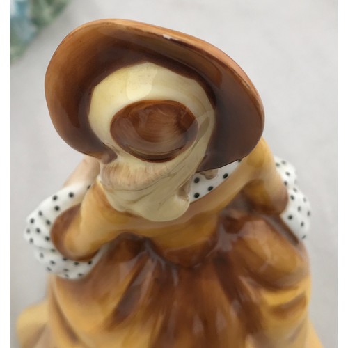 89 - Four Royal Doulton figurines: 