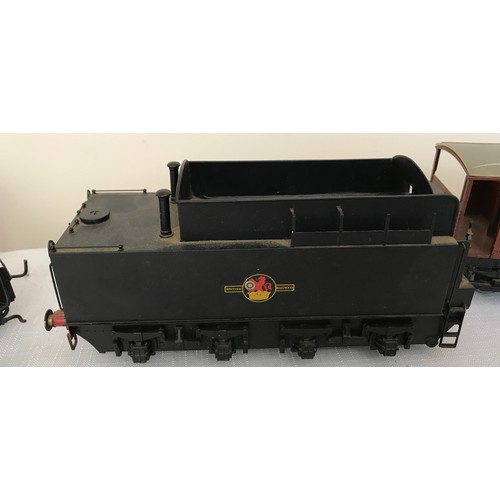 688 - An 0 gauge scale model BR tinplate Locomotive Engine 90178 and Tender together with 2 plastic model ... 